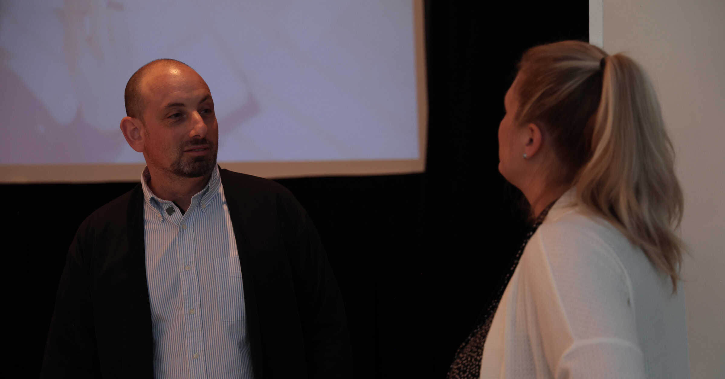 Consultants speaking about hiring best practices.