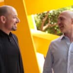 Two consulting business founders discussing success mindset, actions and habits for growth.