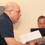 Consultant going over their statement of work.