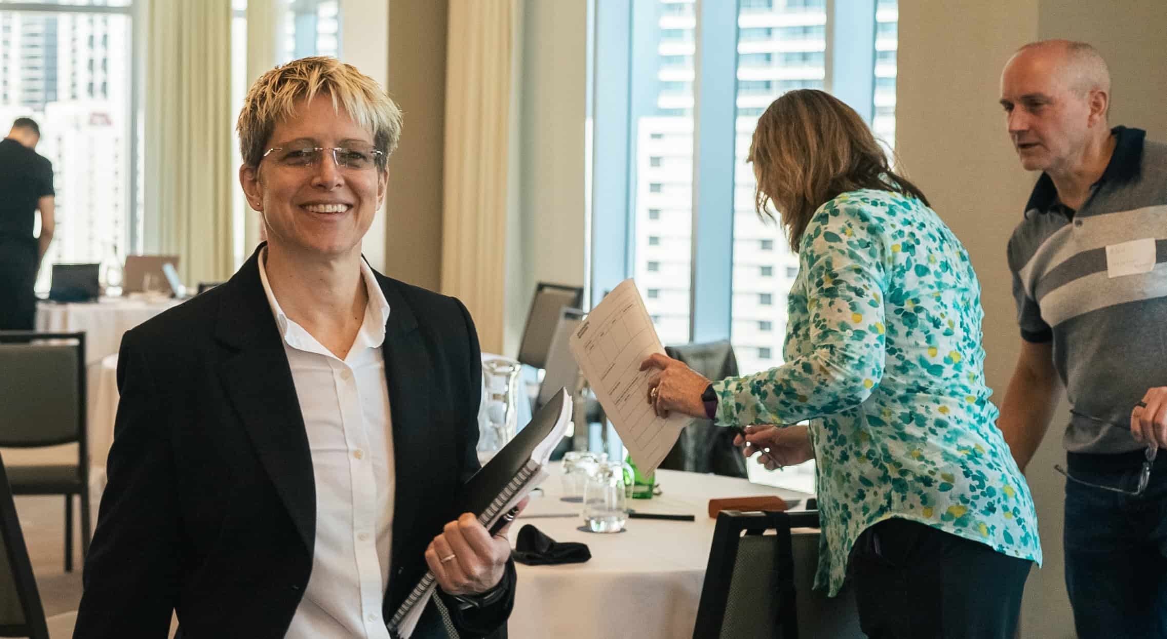 Fractional consultant walking confidently through client office space.