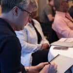 Consultant in a coaching program learning how to scale his business into the 7 figures.