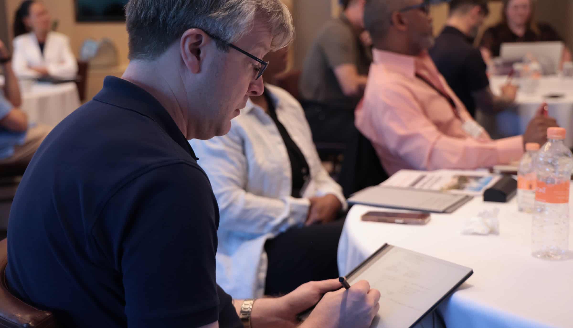 Consultant in a coaching program learning how to scale his business into the 7 figures.