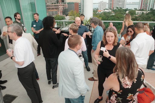 Mastermind Attendees Listening to Speaker