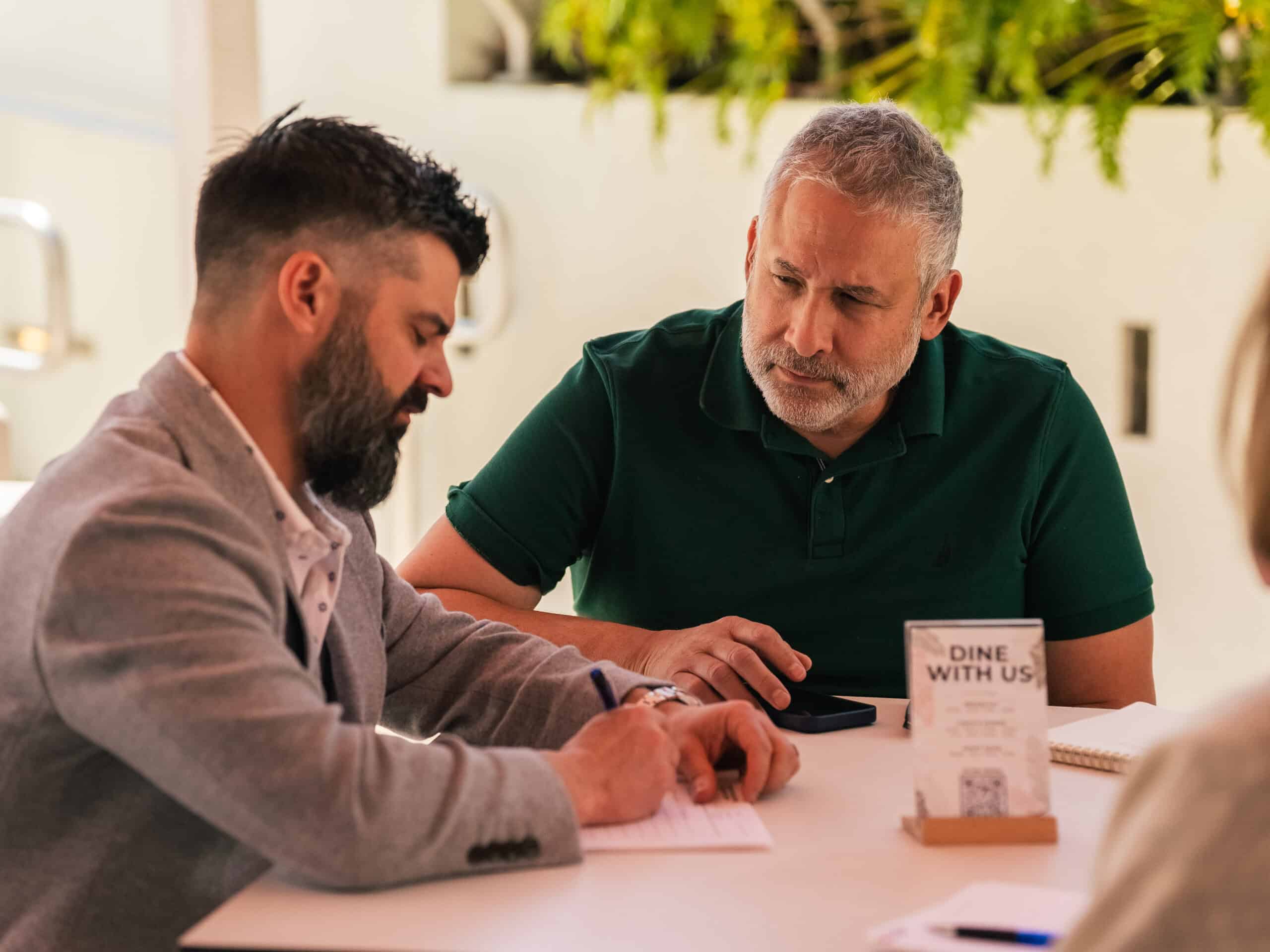 A consultant reviewing prospects and choosing which clients to take on, illustrating selective client selection over a full calendar.
