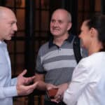Michael Zipursky talking with consulting founders at a Consulting Success mastermind about delegating decisions and building a business that runs without them.