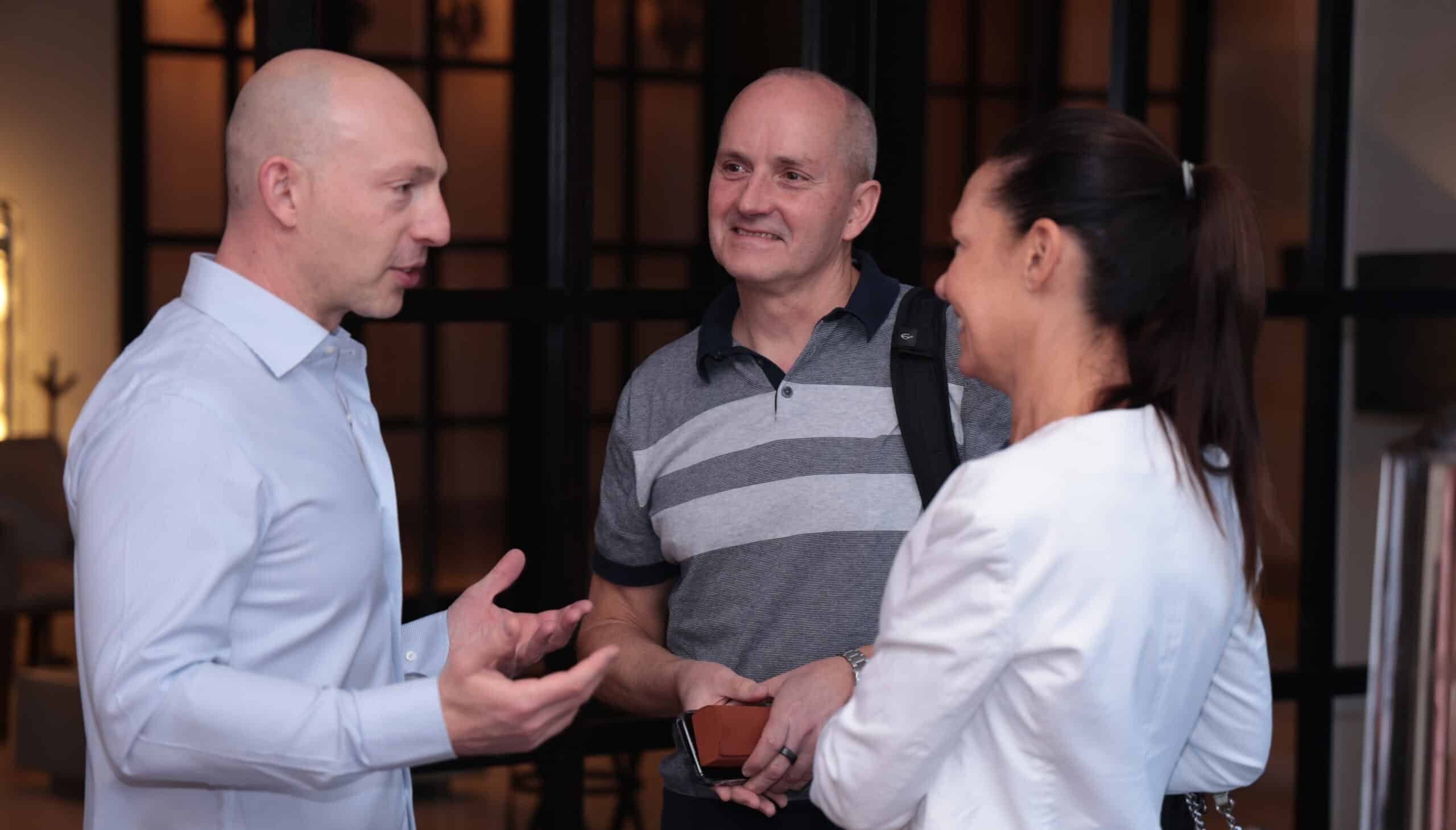 Michael Zipursky talking with consulting founders at a Consulting Success mastermind about delegating decisions and building a business that runs without them.